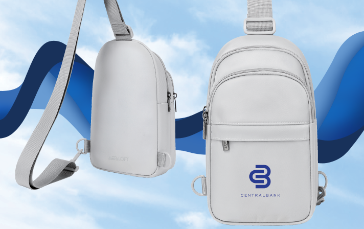 Navy backpack against a blue sky